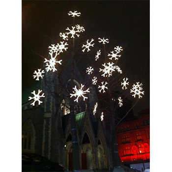 A tree with snowflake lights